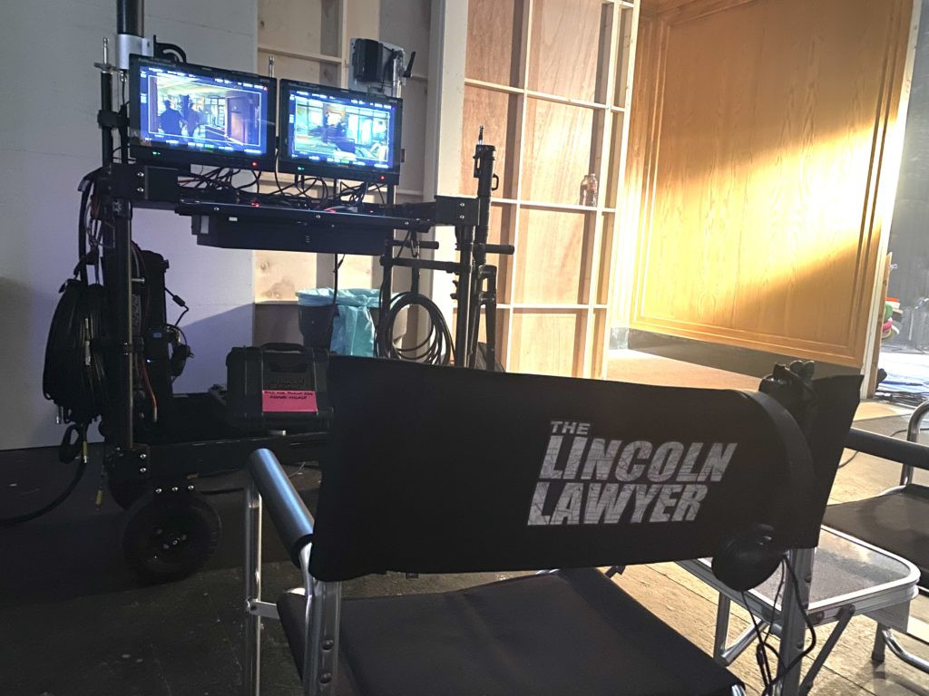 Production Photos of The Lincoln Lawyer, capturing the team in action during filming and set preparations