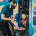 Man receiving leg bandage after injury, emphasizing the need for care and potential legal advice