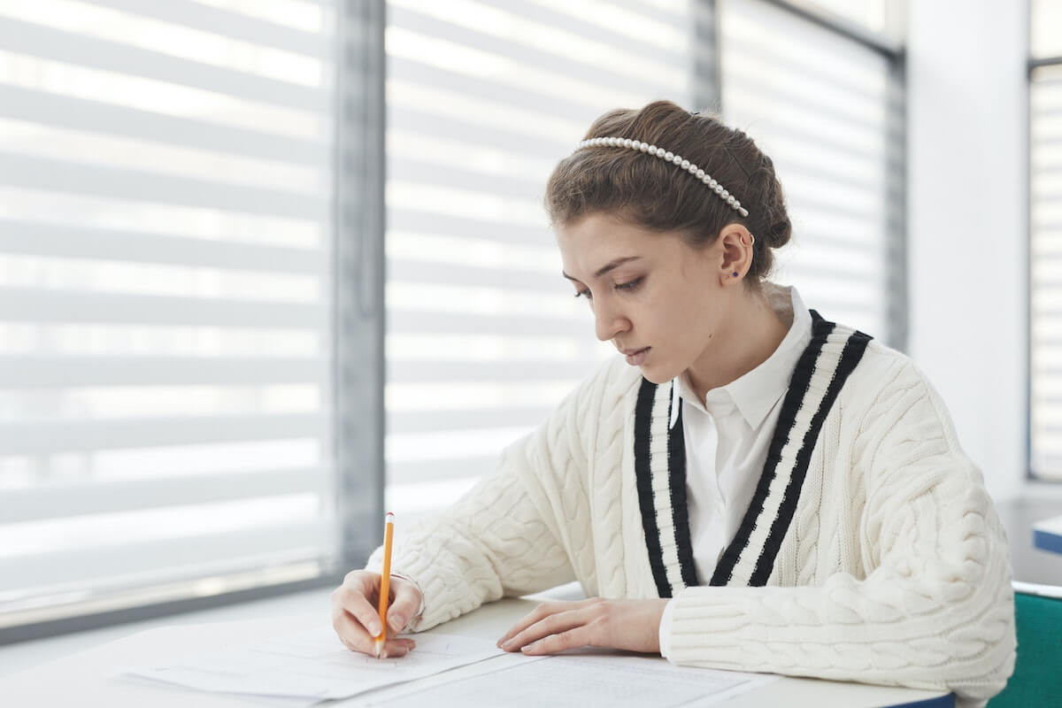 A hopeful law school student preparing for the LSAT exam, a crucial step to becoming an immigration lawyer.