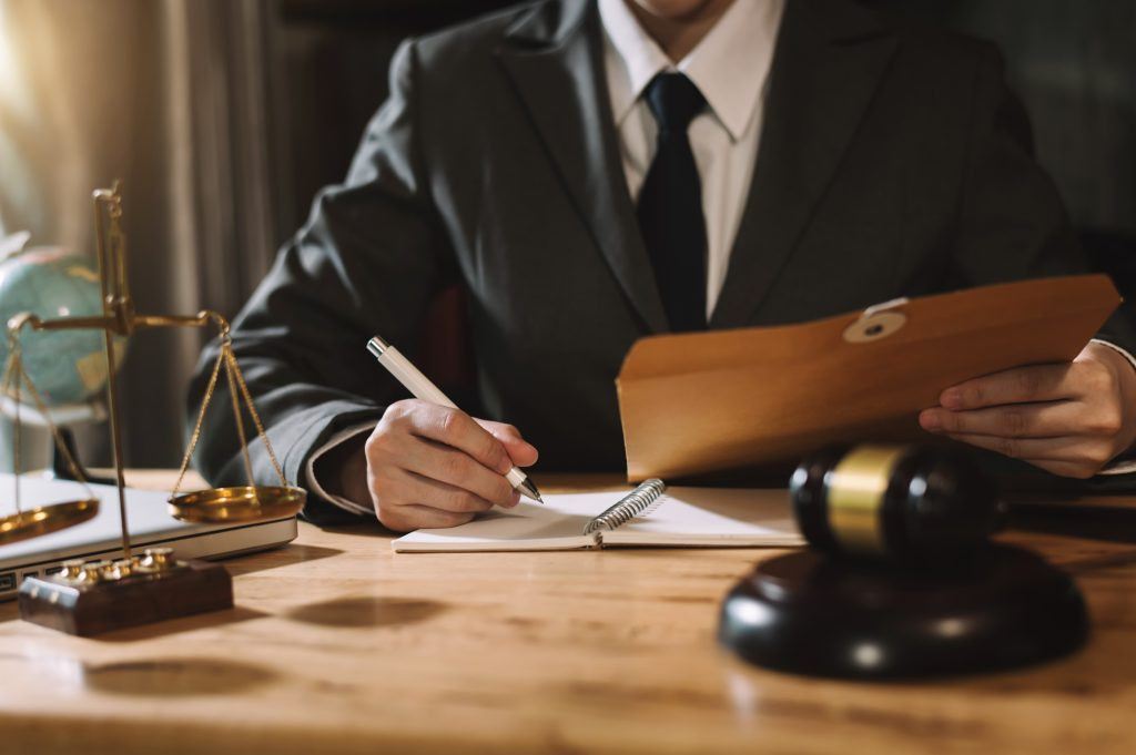 A judge presiding in a courtroom, representing the judicial system and legal proceedings.