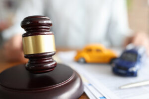 Courthouse and gavel representing filing a lawsuit after car accident