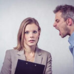 Worried employee seeking help from a Phoenix employment lawyer for a free consultation to discuss their workplace rights in Arizona.