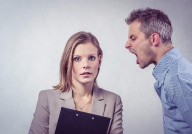 Worried employee seeking help from a Phoenix employment lawyer for a free consultation to discuss their workplace rights in Arizona.