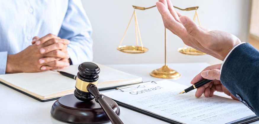 Image of supportive legal team discussing a case