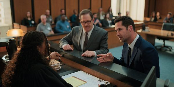 A tense courtroom scene from The Lincoln Lawyer Season 3, highlighting the high-stakes legal battles