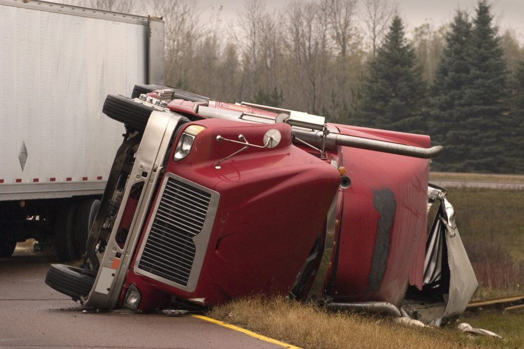 Experienced Phoenix truck accident attorney reviewing documents