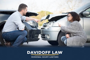 Lawyer pointing at accident diagram, representing fault determination