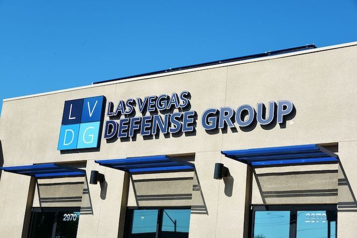 Exterior of Las Vegas Defense Group offices, displaying the LVDG logo.