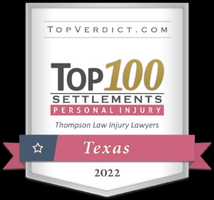 Award badge recognizing Dallas personal injury law firm among top 100 Texas settlements in 2022, highlighting their success in personal injury cases.