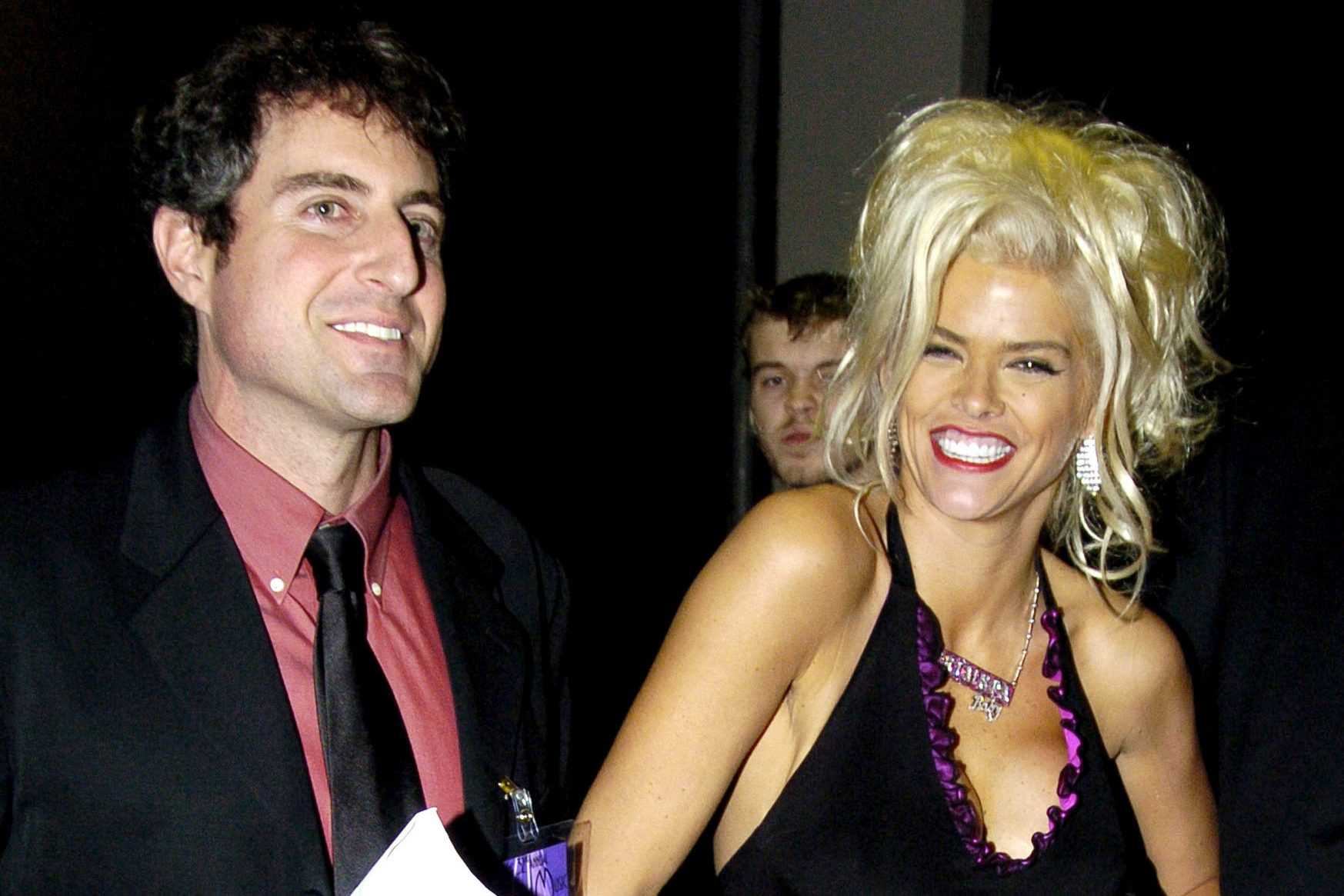 Howard K. Stern and Anna Nicole Smith during happier times, showcasing their close relationship.