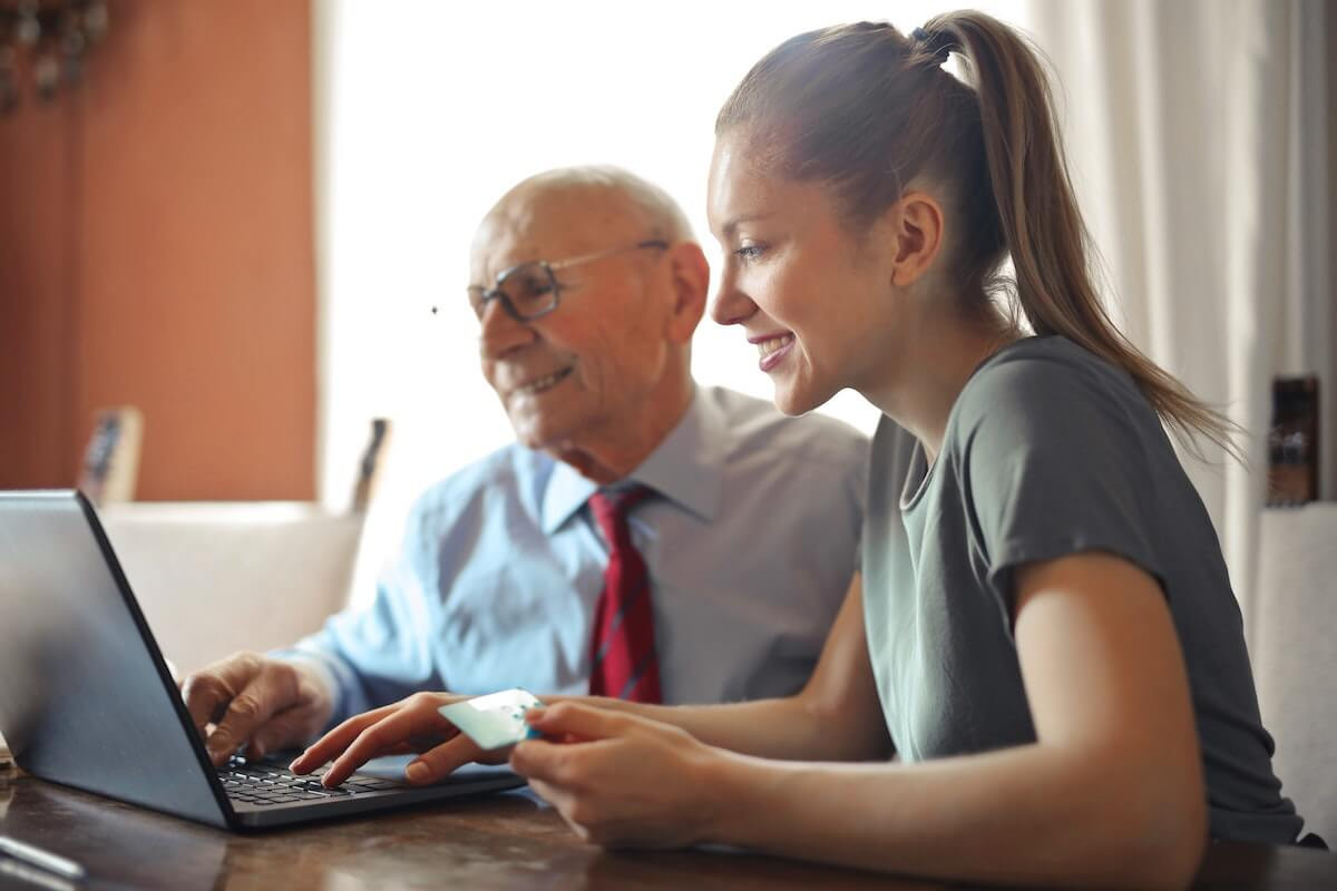 Immigration lawyers collaborating using technology in their law firm