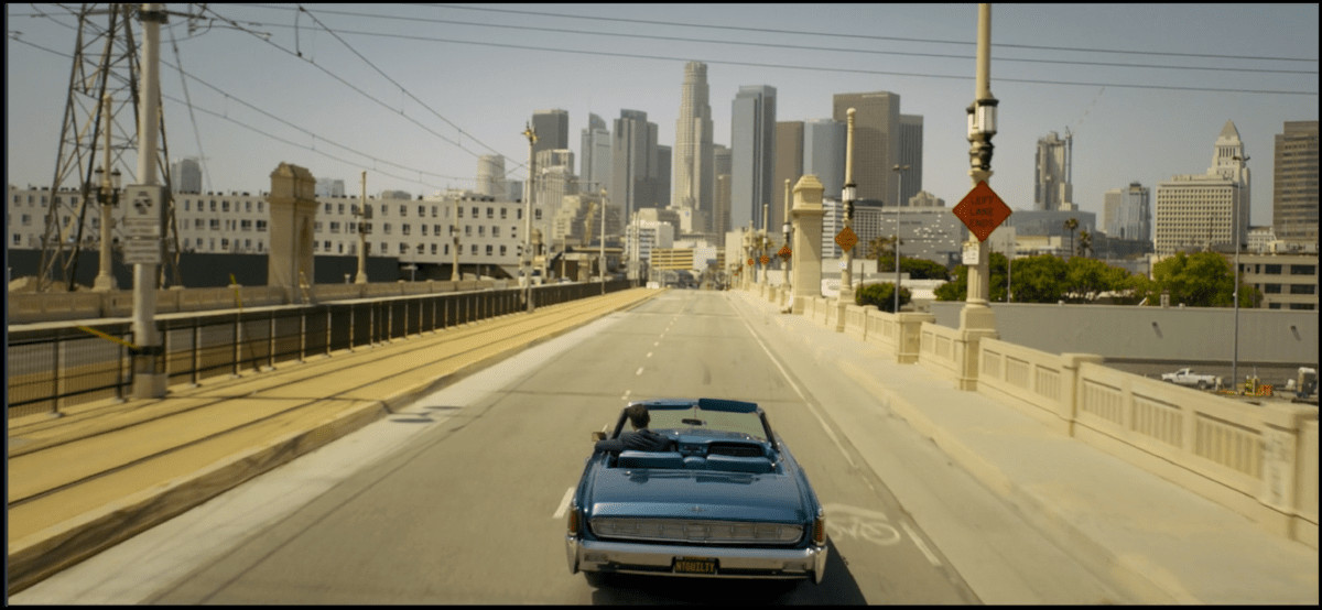 Mickey Haller choosing the 1963 Lincoln Continental convertible to drive to court in The Lincoln Lawyer