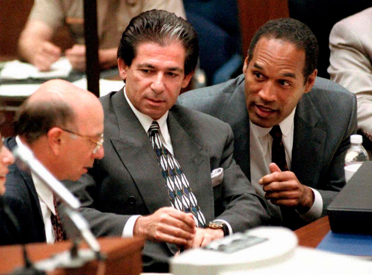 Robert Kardashian (center) with O.J. Simpson and Alvin Michaelson during a hearing in Los Angeles, May 3, 1995