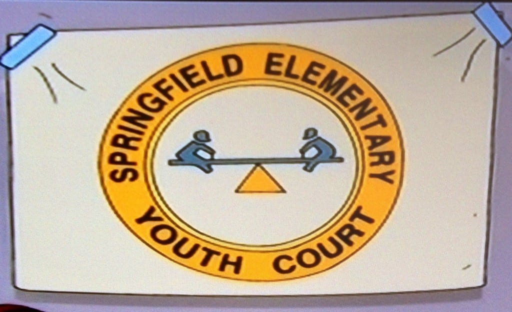 Simpsons Youth Court flag logo featuring a teeter-totter instead of scales of justice