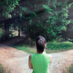 Woman with a choice near the forked road