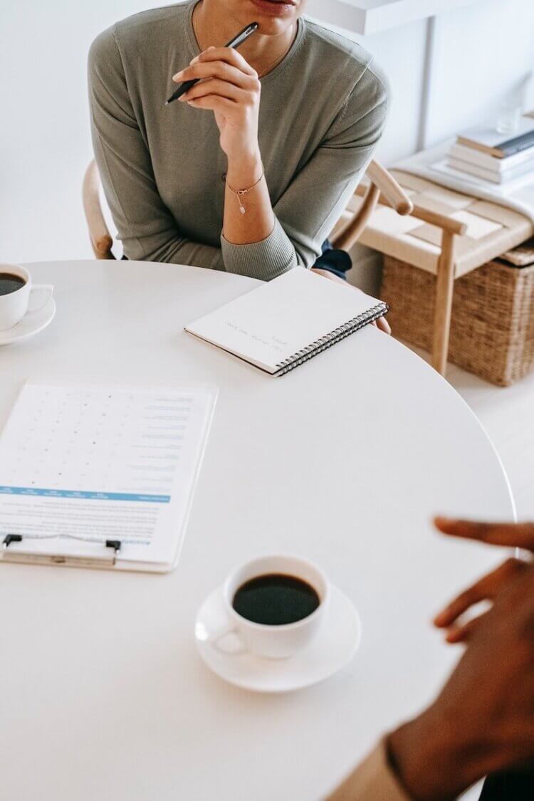 Legal consultant advising a client on a business contract