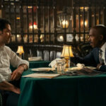 Lincoln Lawyer. (L to R) Manuel Garcia-Rulfo as Mickey Haller, Ntare Guma Mbaho Mwine as Detective Raymond Griggs in episode 104 of The Lincoln Lawyer. Cr. Lara Solanki/Netflix © 2022