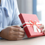 A set of scales representing fairness and balance, symbolizing legal ethics in gift-giving between attorneys and clients.