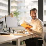 A legal assistant managing legal documents in an organized manner