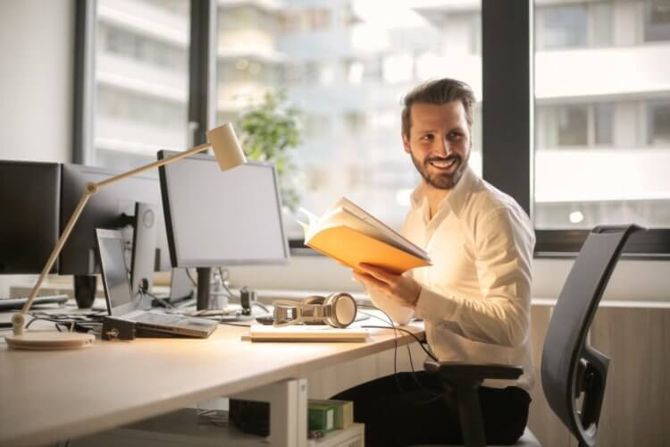 A legal assistant managing legal documents in an organized manner