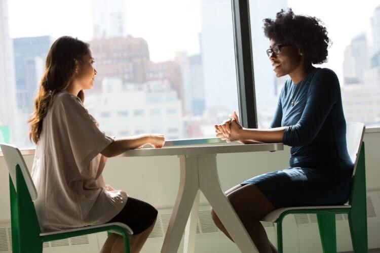 A legal professional reviewing a legal assistant's work
